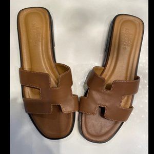 Hermes oran sandals brown